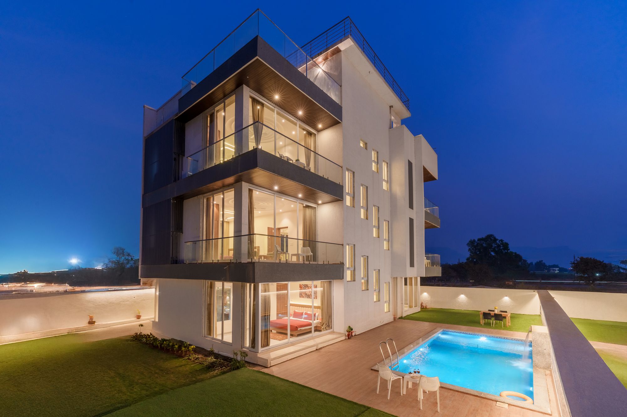 Contemporary luxury villa illuminated at twilight